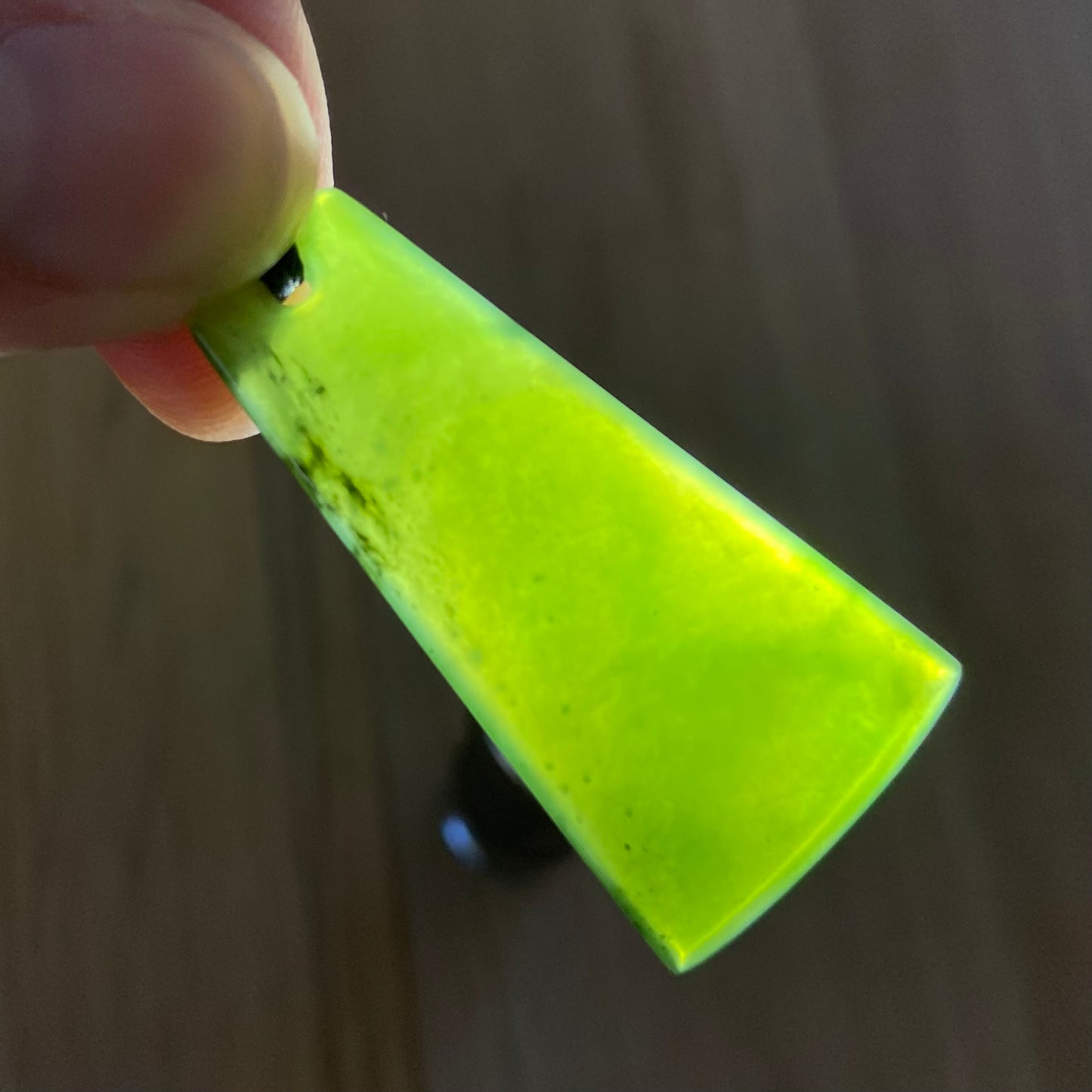 Toki pendant hand-carved from New Zealand kahurangi pounamu (greenstone). Translucency.