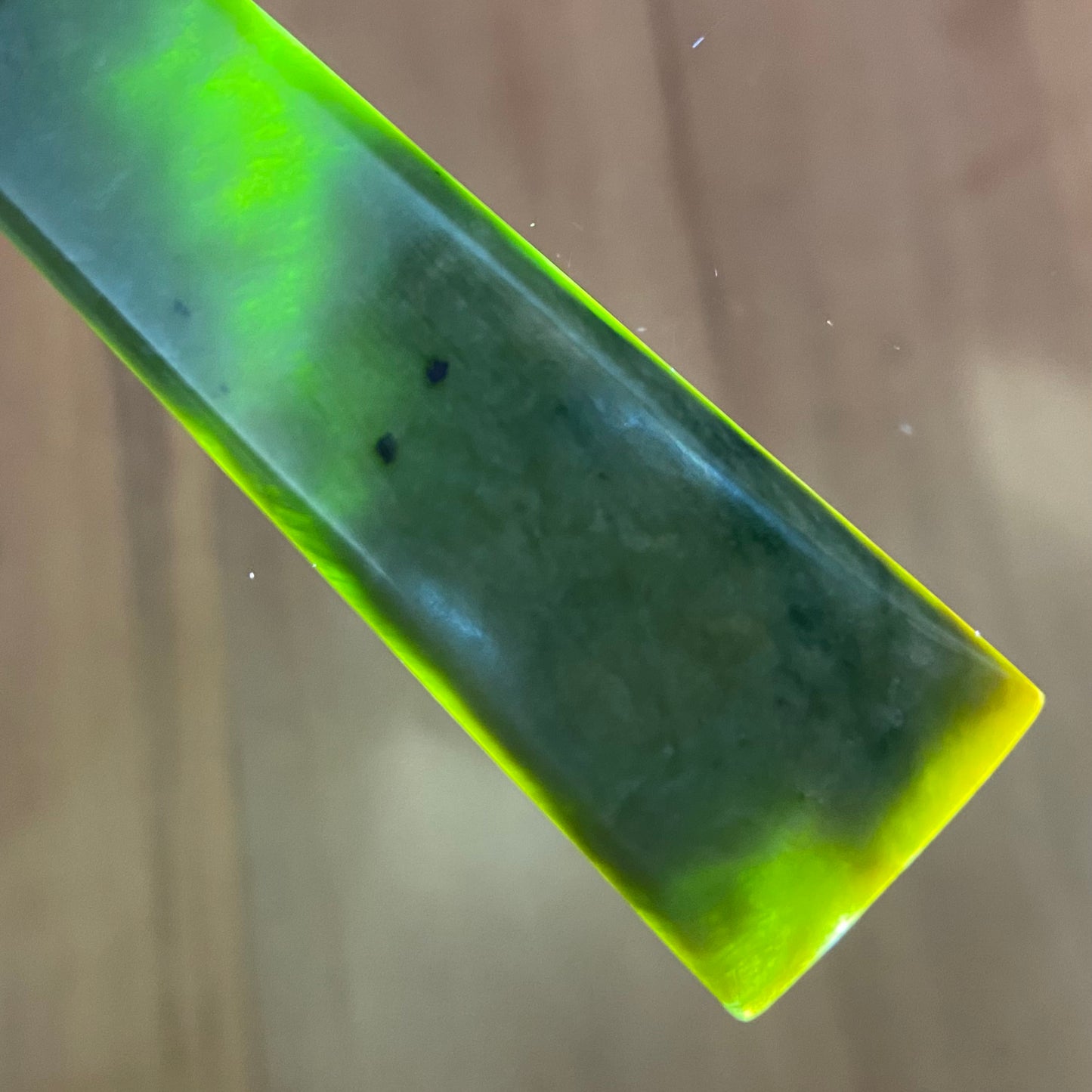 Toki and roimata pendant set hand-carved from New Zealand Marsden Flower Jade/ pounamu (greenstone). Translucency.