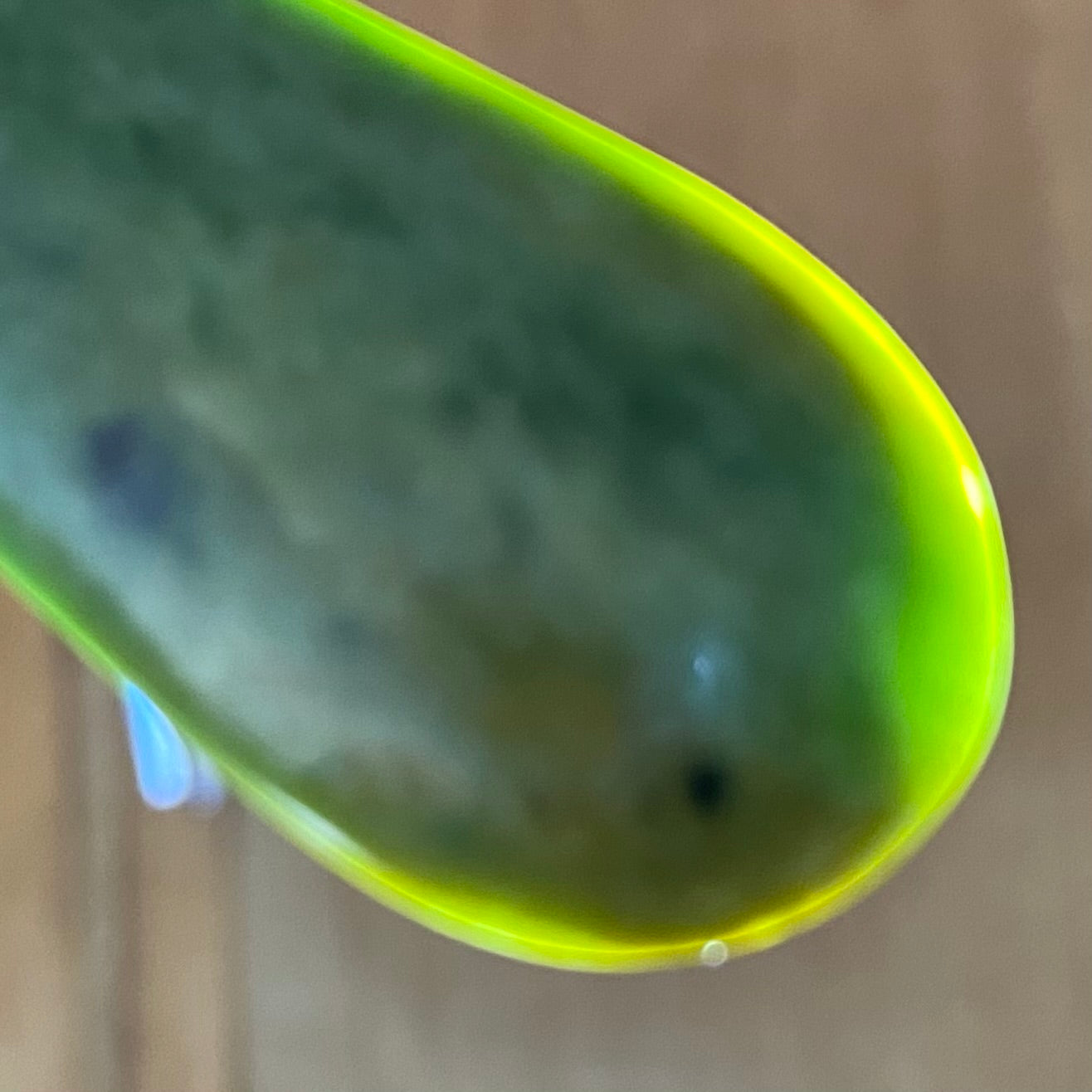 Roimata pendant set hand-carved from New Zealand Marsden Flower Jade/ pounamu (greenstone). Perfect for best friends. Translucency.
