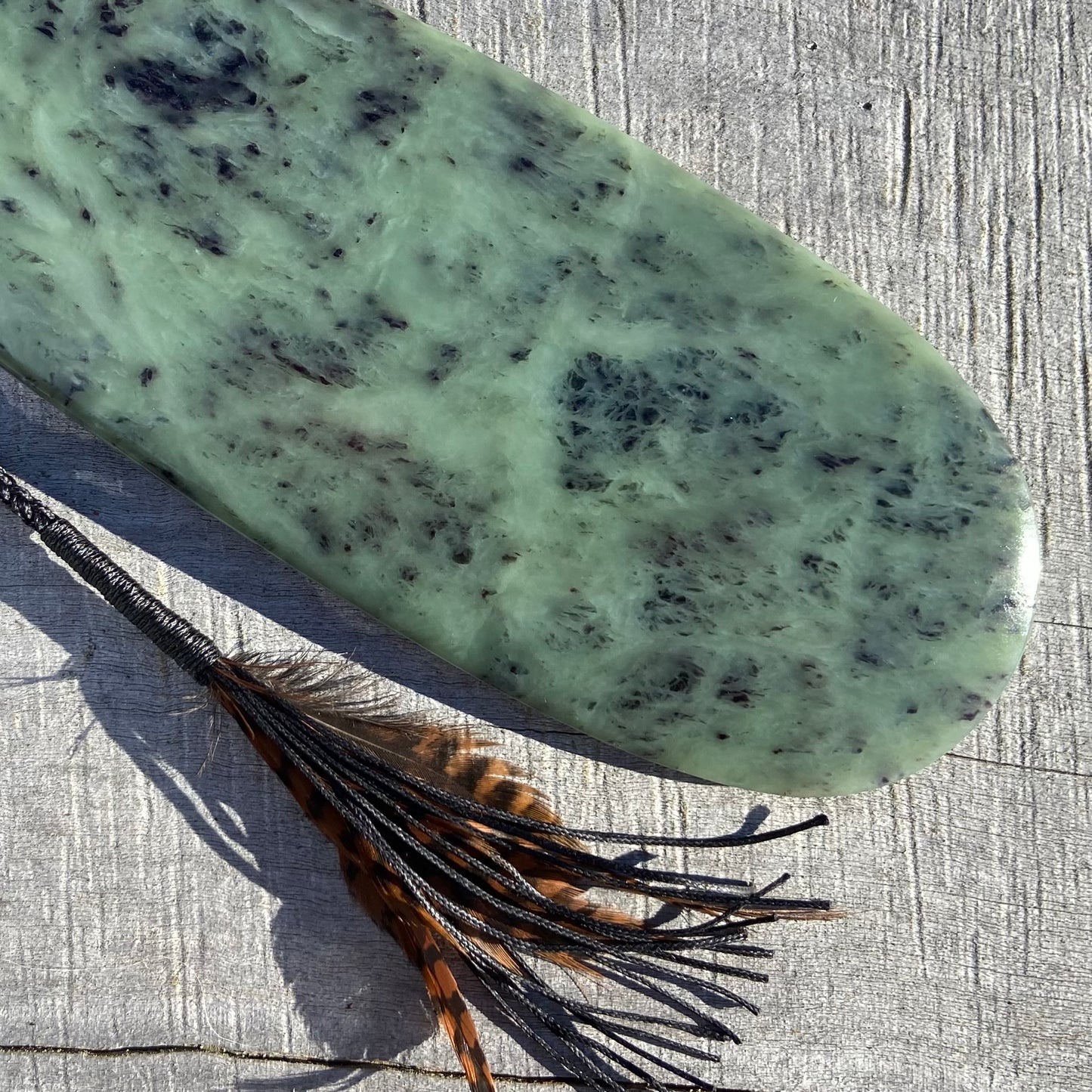 Pounamu mere hand-carved from South Westland Inanga pounamu (greenstone). End.