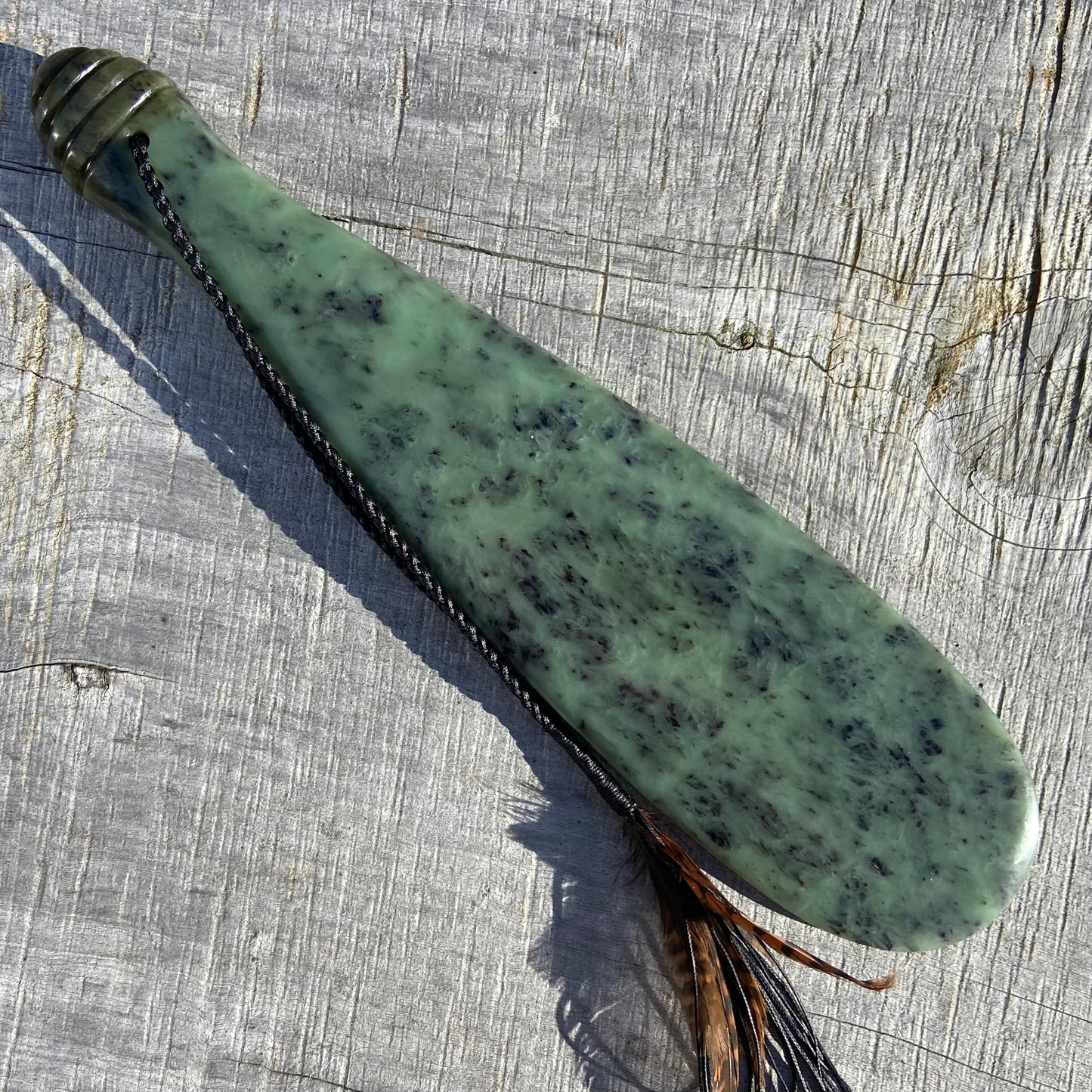 Pounamu mere hand-carved from South Westland Inanga pounamu (greenstone). Back.