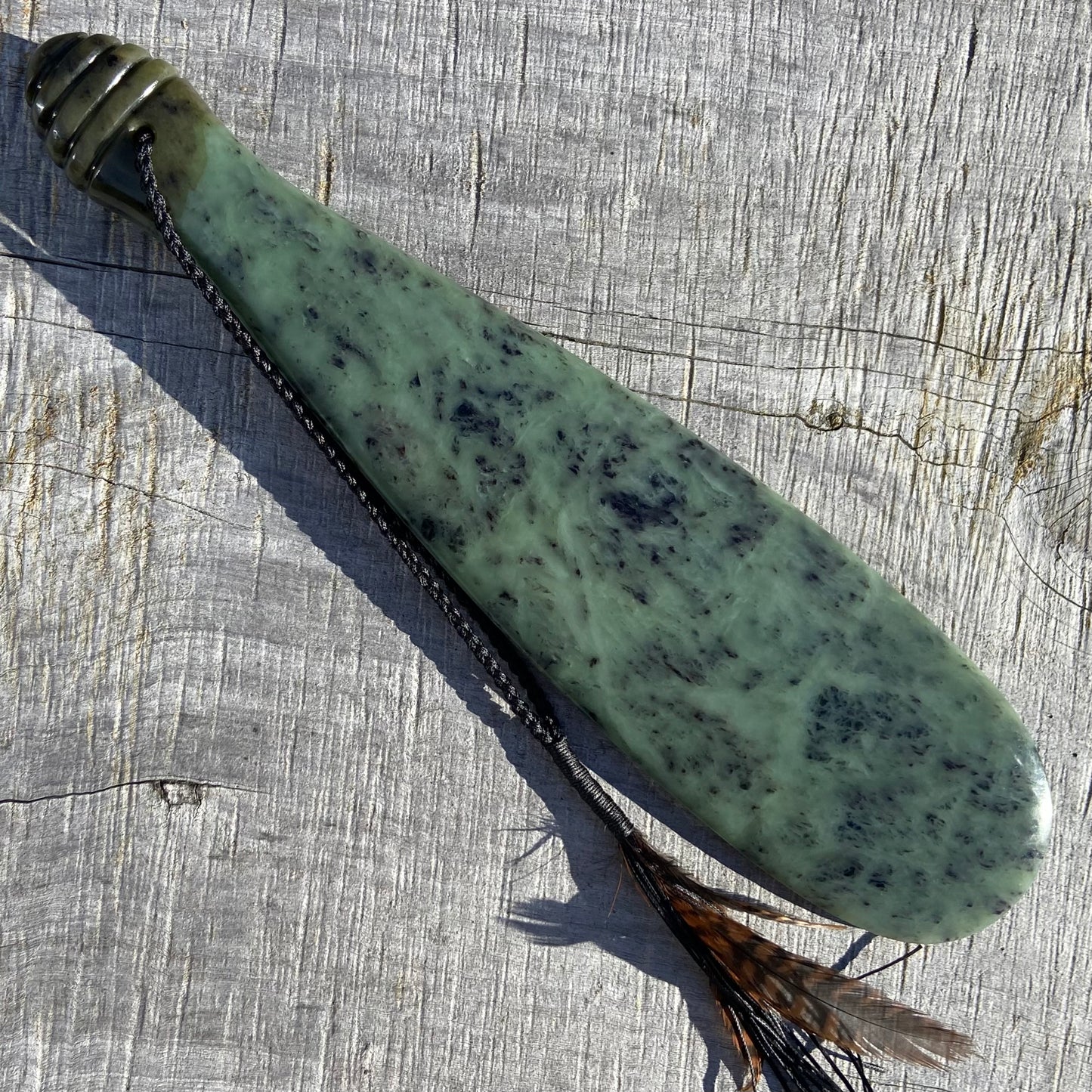 Pounamu mere hand-carved from South Westland Inanga pounamu (greenstone). Front.
