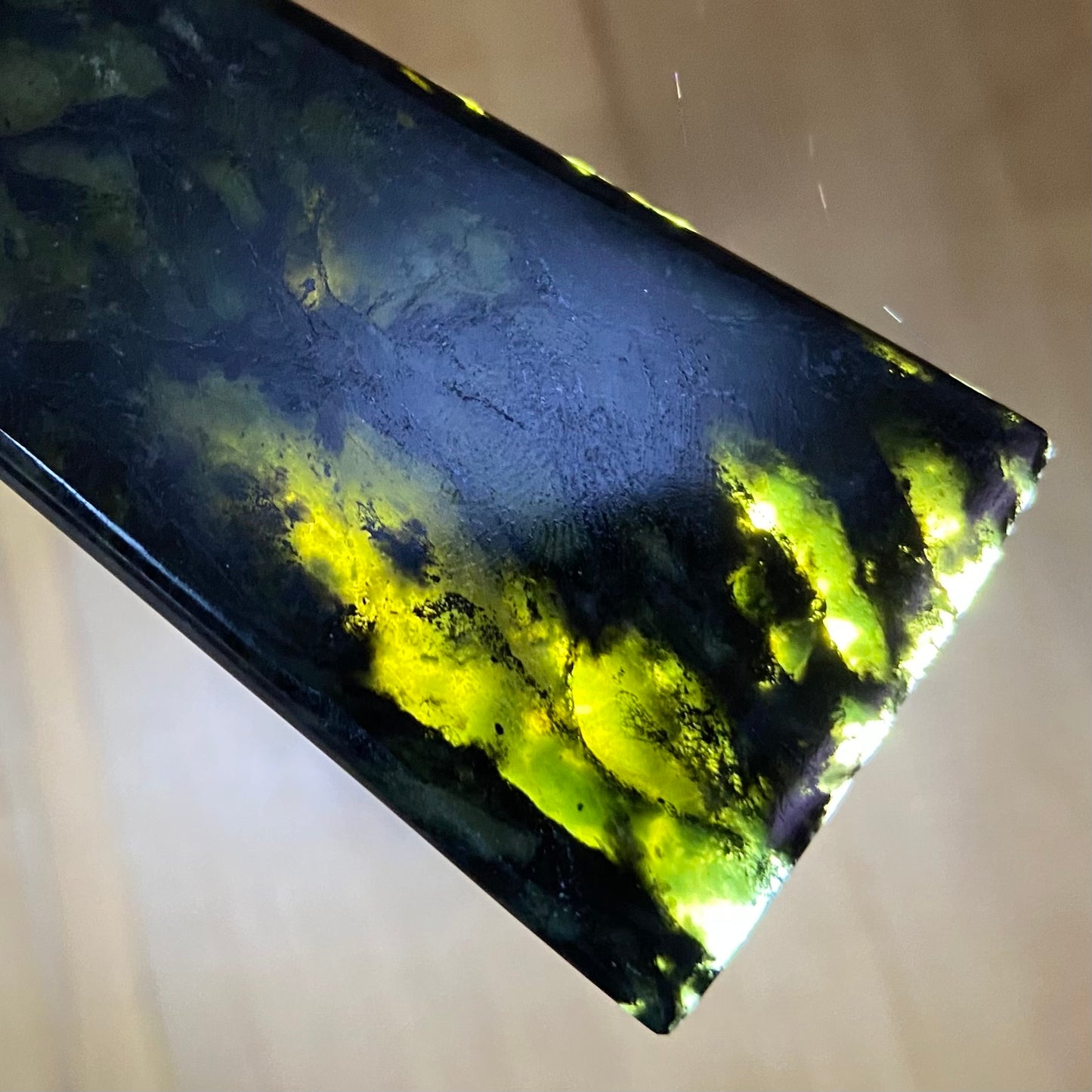 Bound toki pendant hand-carved from New Zealand Douglas Creek pounamu (greenstone). Translucency.