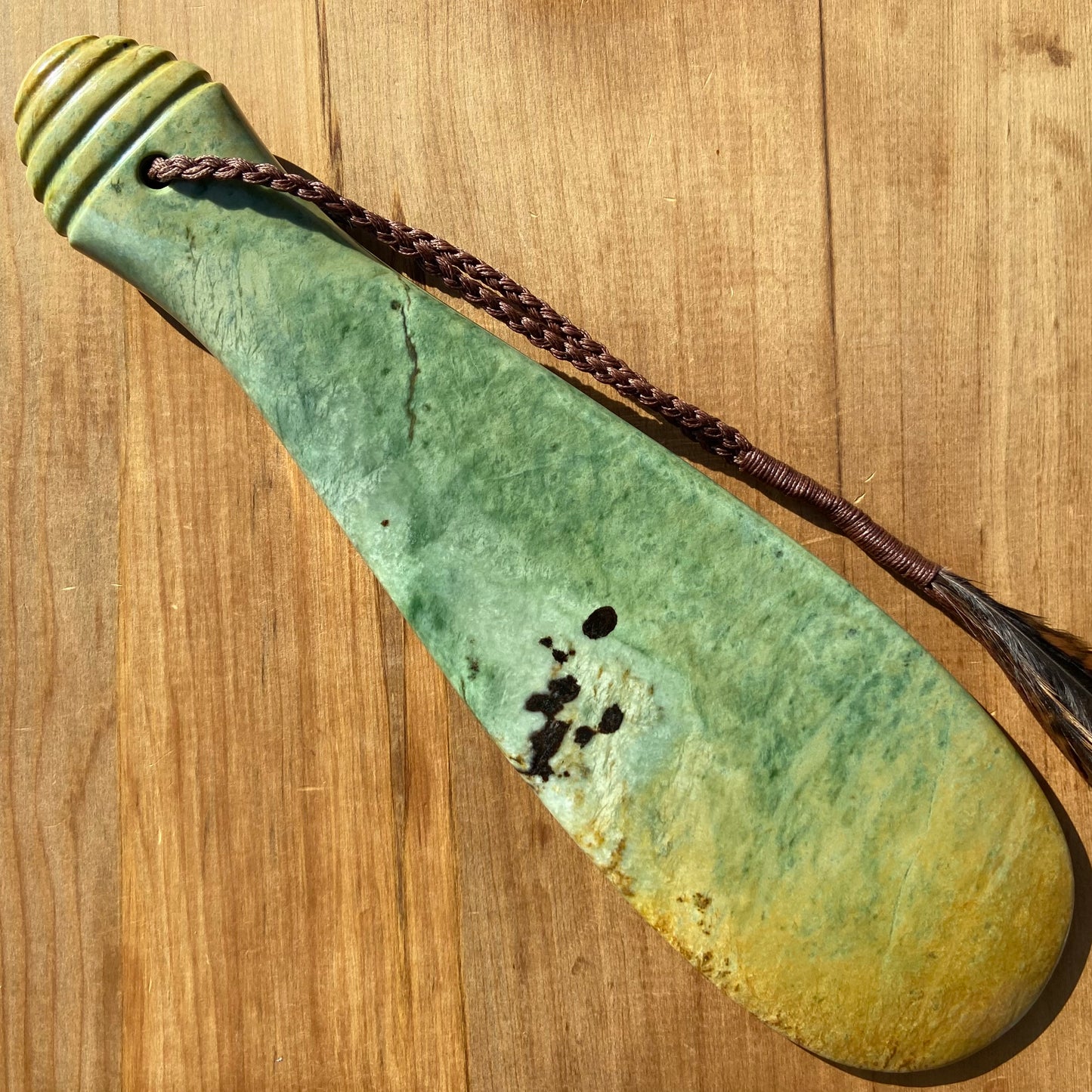 Pounamu mere hand-carved from Marsden flower jade pounamu (greenstone). Back.