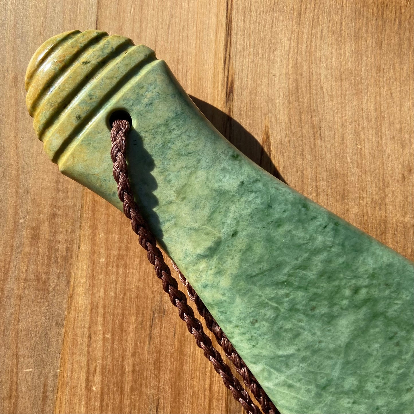 Pounamu mere hand-carved from Marsden flower jade pounamu (greenstone). Handle