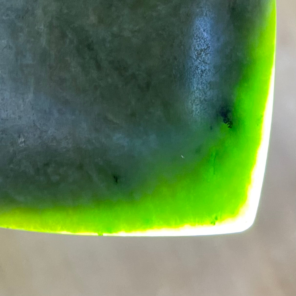 Pounamu heart shape pendant carved from New Zealand Marsden Flower Jade (greenstone). Translucency. Large