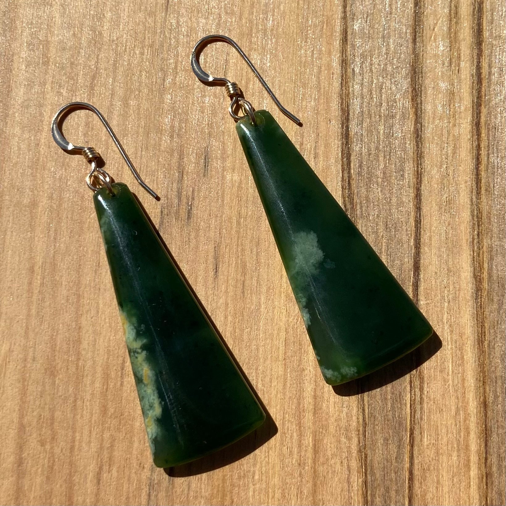 Pair of  toki earrings hand-carved from New Zealand Marsden Flower Jade/ pounamu (greenstone), with gold  fittings. Back