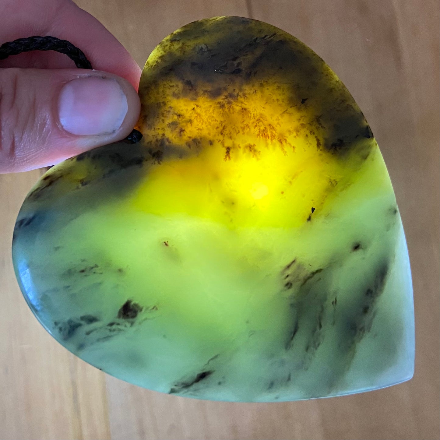 Pounamu heart shaped pendant carved from New Zealand South Westland inanga pounamu (greenstone). Translucency. Extra Large