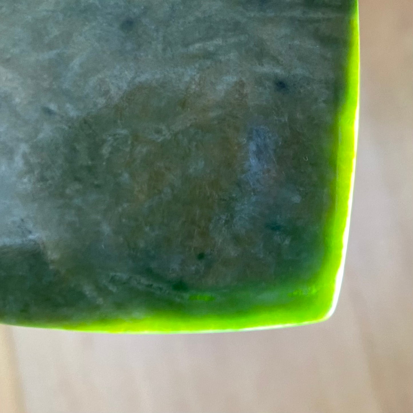 Pounamu heart shape pendant carved from New Zealand Marsden Flower Jade (greenstone). Translucency. Extra Large