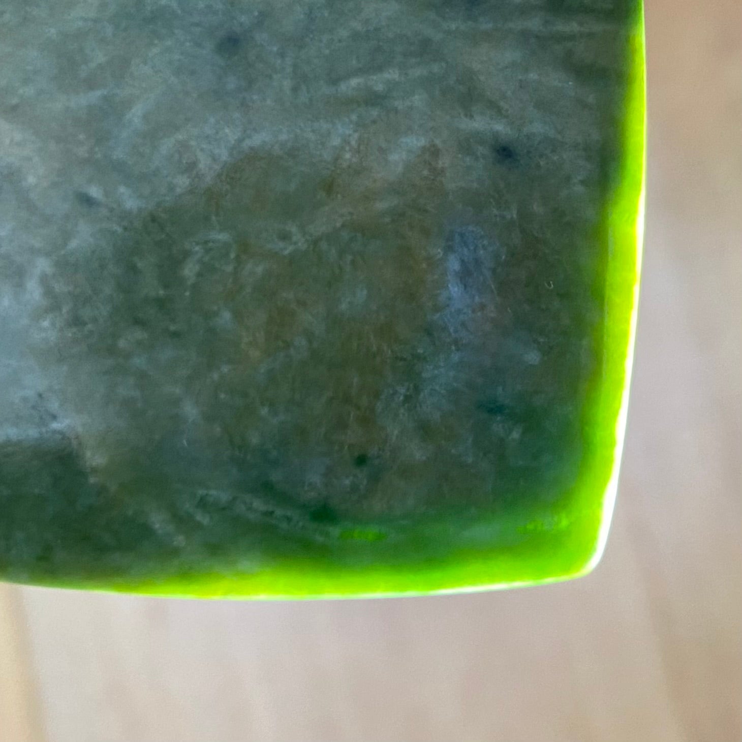 Pounamu heart shape pendant carved from New Zealand Marsden Flower Jade (greenstone). Translucency. Extra Large