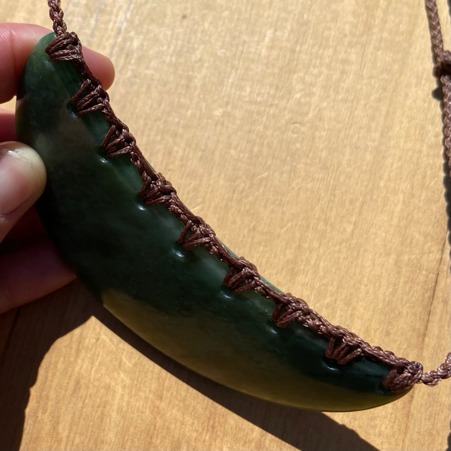 Breastplate pendant hand-carved from New Zealand kahurangi pounamu (greenstone). Cord.