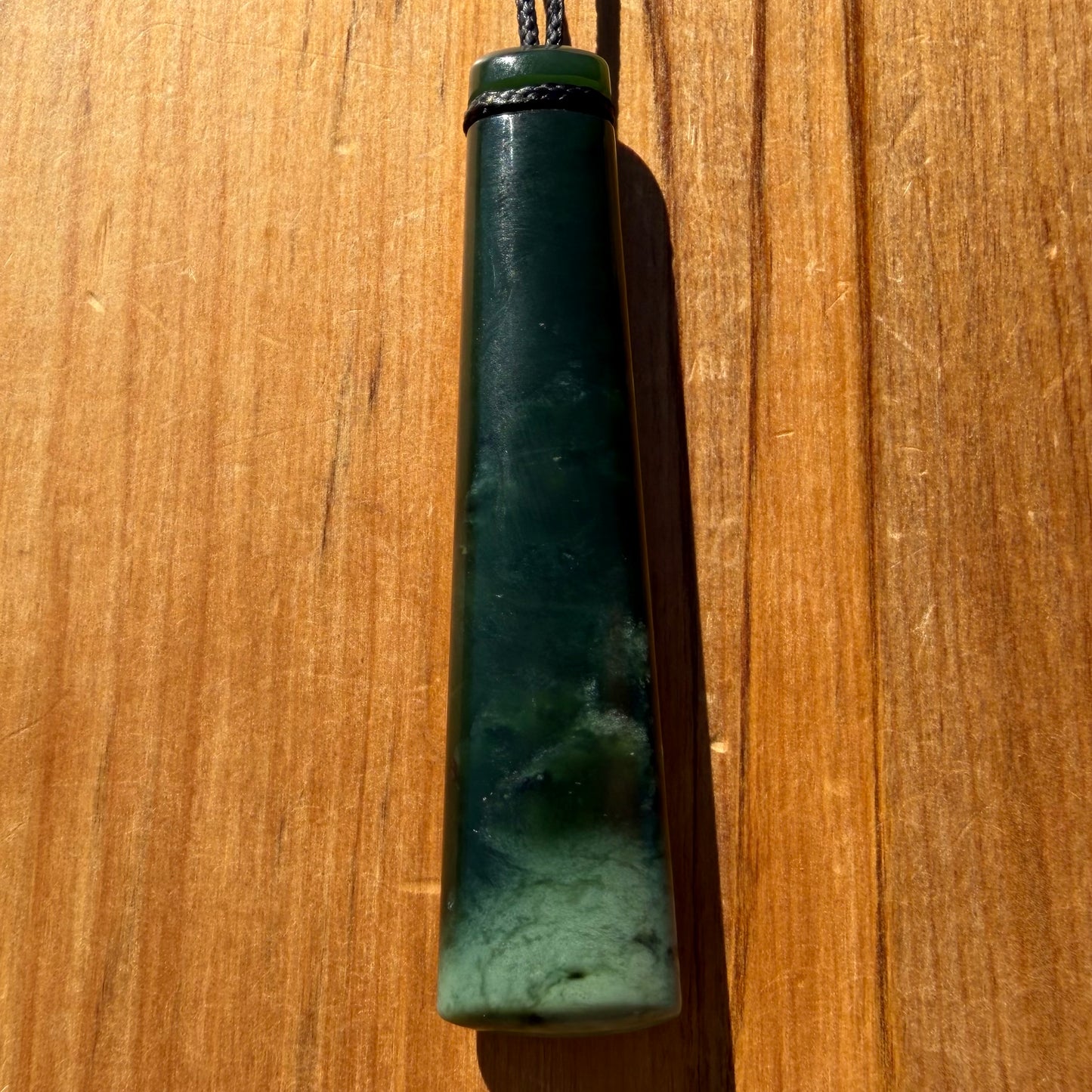 Pounamu toki from New Zealand Kawakawa pounamu (greenstone). Front.