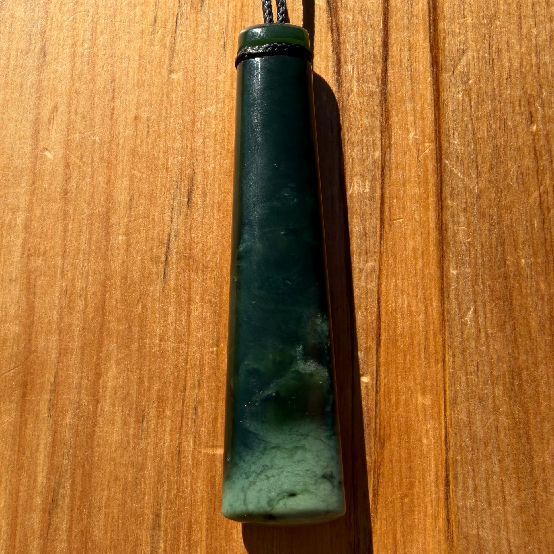 Pounamu toki from New Zealand Kawakawa pounamu (greenstone). Front.