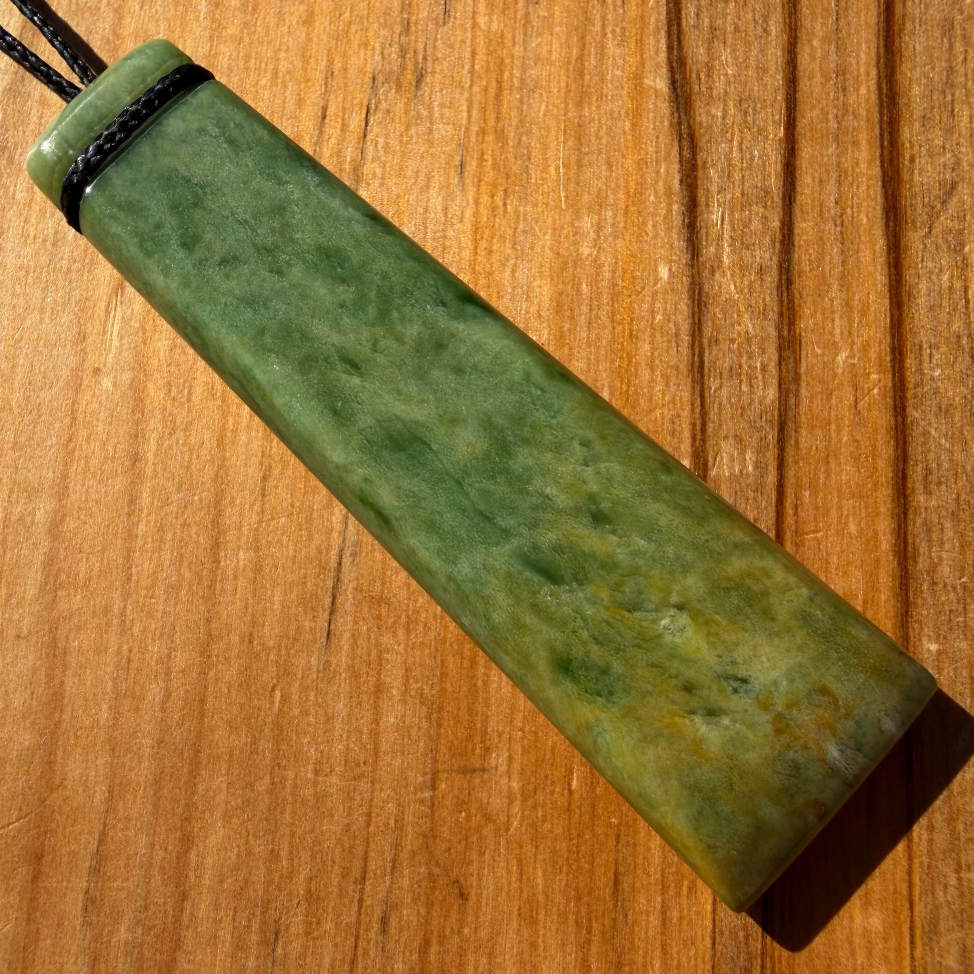 Pounamu toki from NZ Marsden Flower Jade pounamu (greenstone). Front.