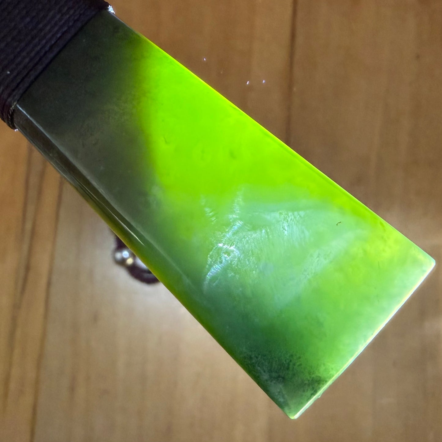 Bound toki pendant hand-carved from NZ Kahurangi pounamu (greenstone). Translucency.