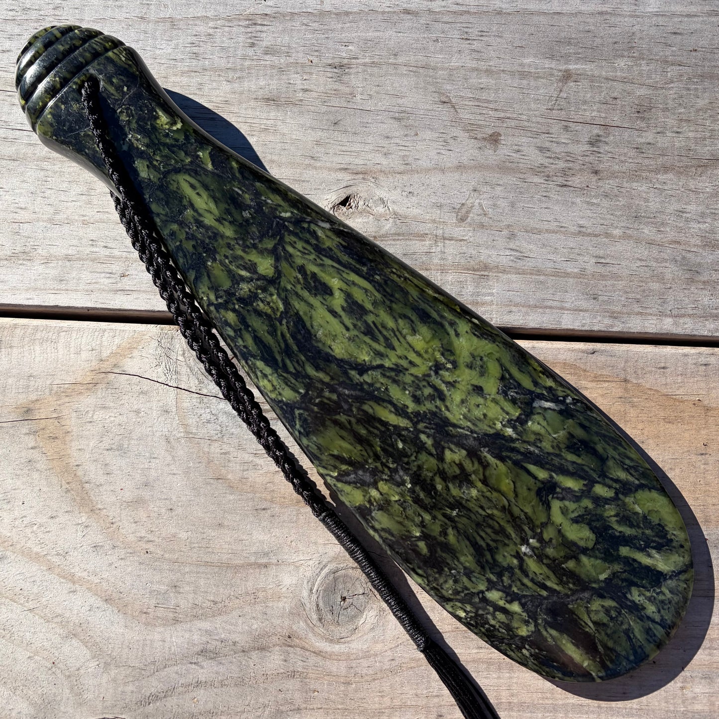Pounamu mere hand-carved from Douglas Creek greenstone (pounamu).