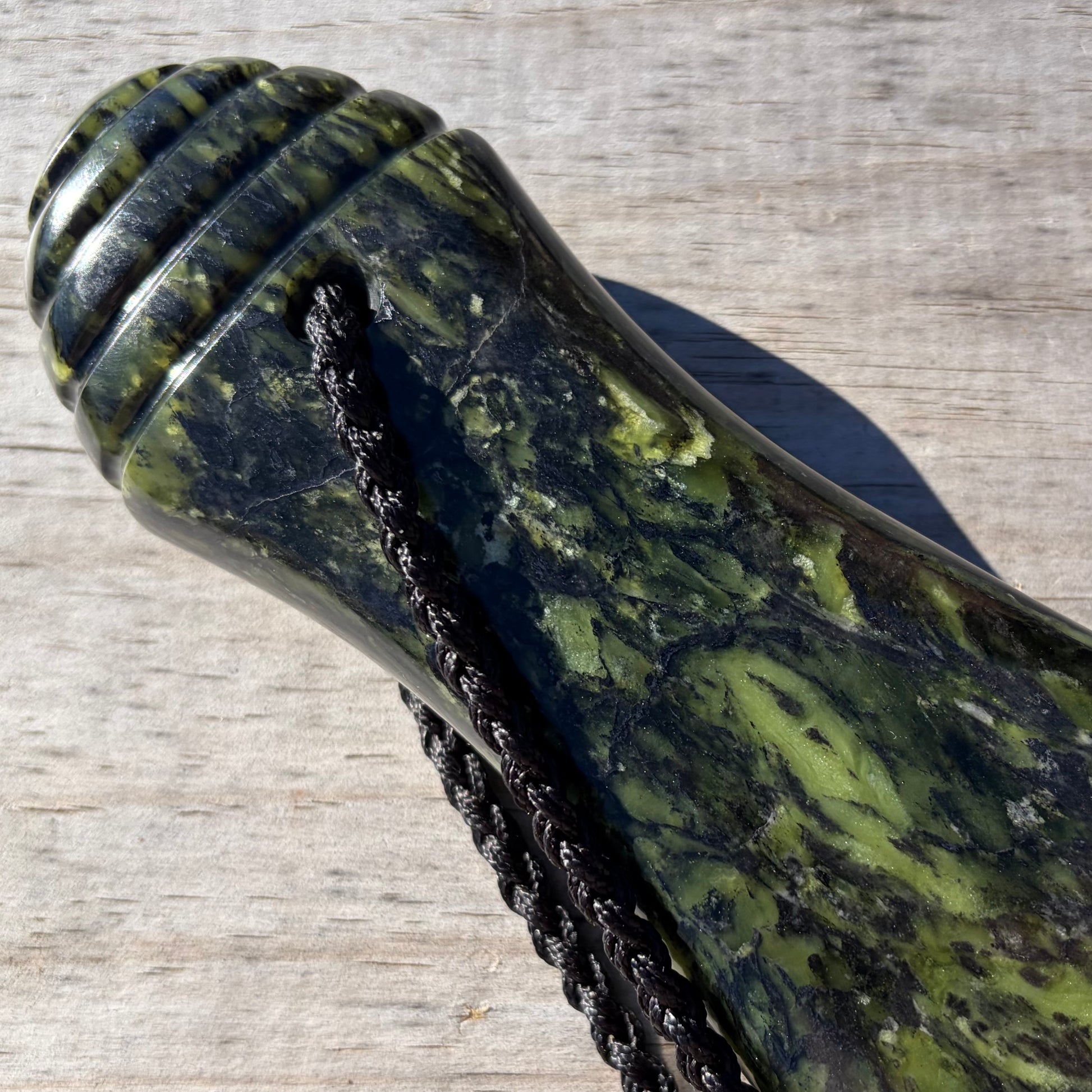 Pounamu mere hand-carved from Douglas Creek greenstone (pounamu).