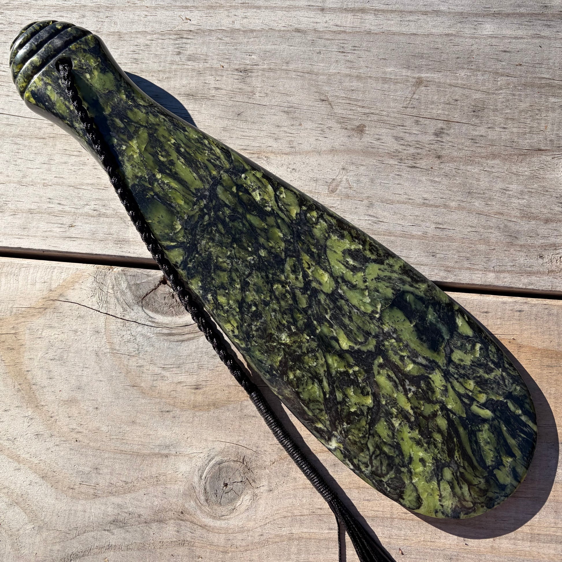 Pounamu mere hand-carved from Douglas Creek greenstone (pounamu).