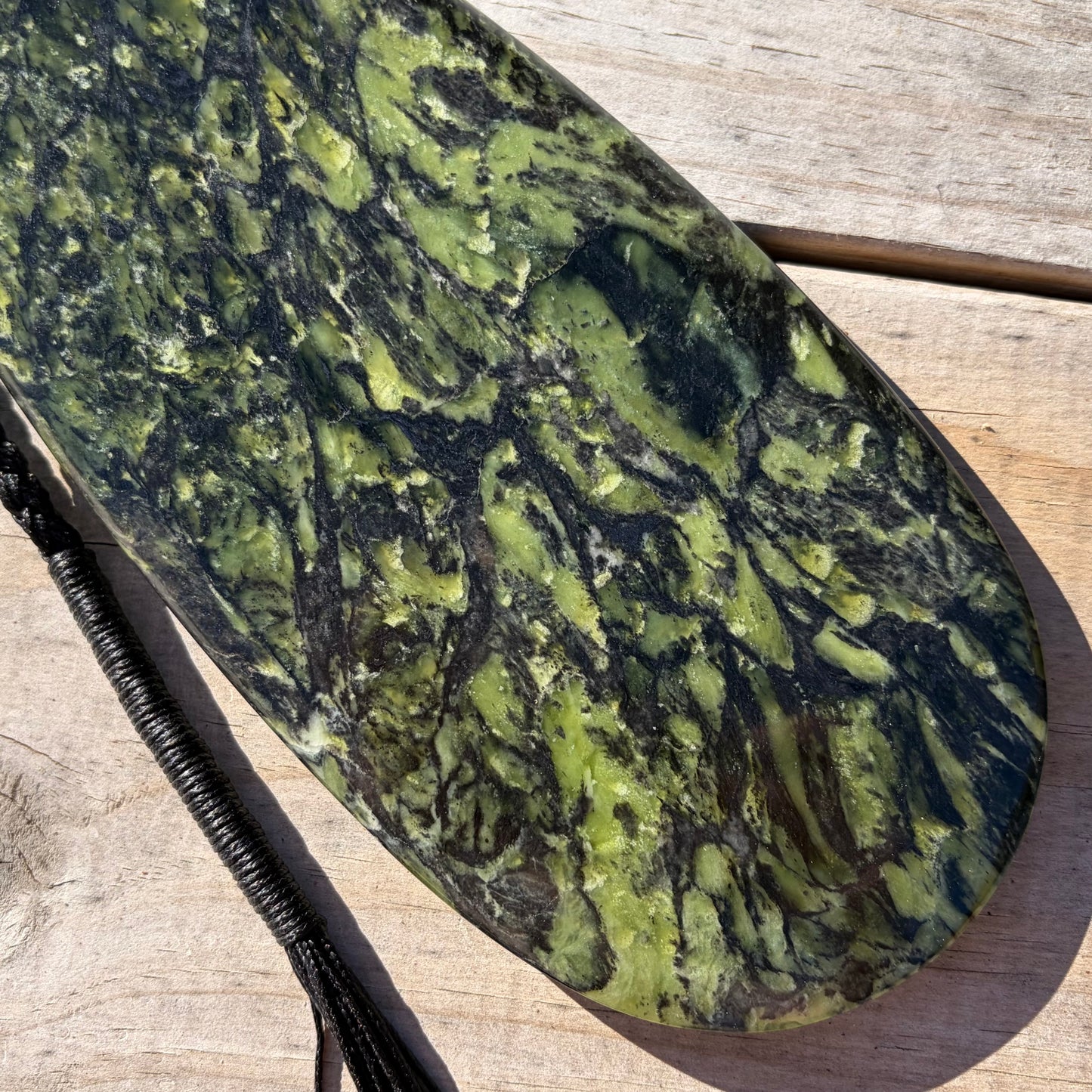 Pounamu mere hand-carved from Douglas Creek greenstone (pounamu).