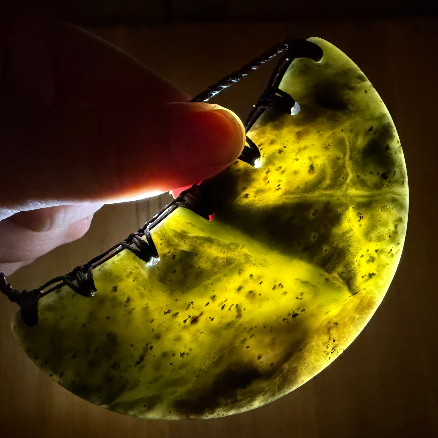 Breastplate pendant hand-carved from New Zealand kawakawa pounamu (greenstone). Translucency.
