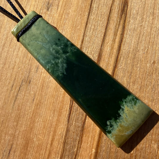 Pounamu toki pendant hand-carved from New Zealand Marsden Flower Jade pounamu (greenstone). Front