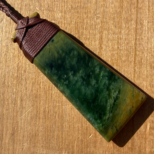Bound pounamu toki pendant hand-carved from New Zealand Marsden Flower Jade pounamu (greenstone). Front