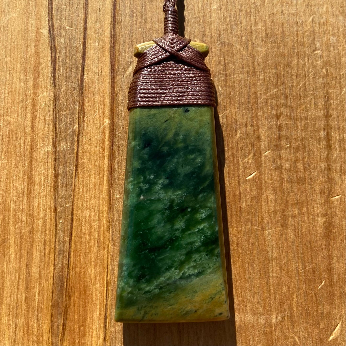 Bound pounamu toki pendant hand-carved from New Zealand Marsden Flower Jade pounamu (greenstone). Front