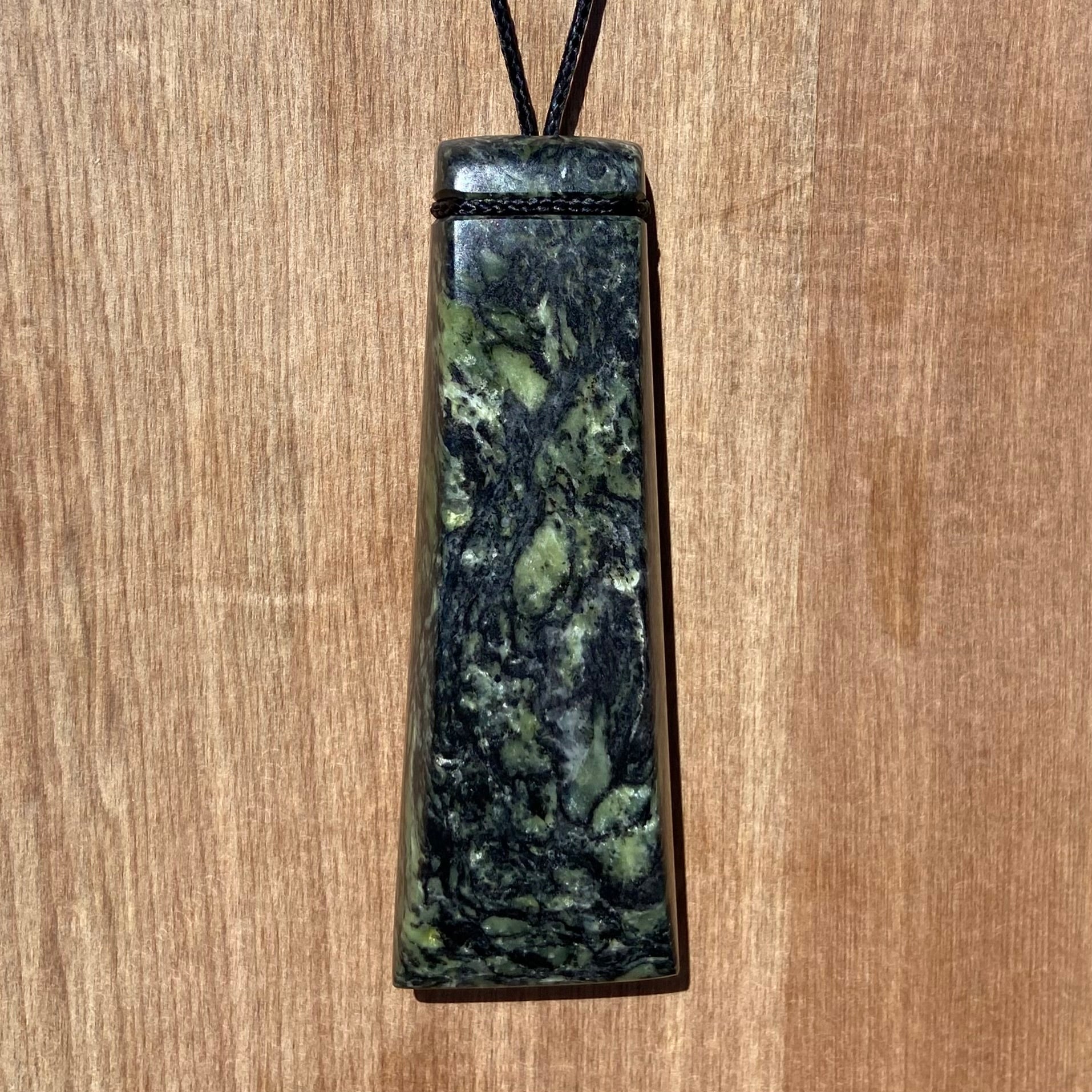 Toki pendant hand-carved from New Zealand Douglas Creek pounamu (greenstone). Front.