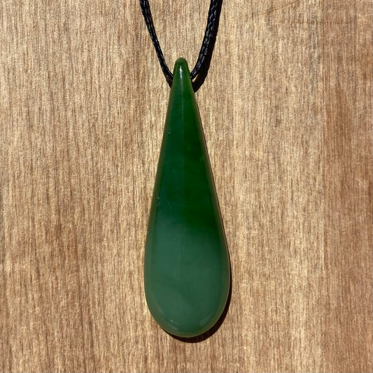 Roimata (teardrop) pendant hand-carved from New Zealand kahurangi pounamu (greenstone). Front.