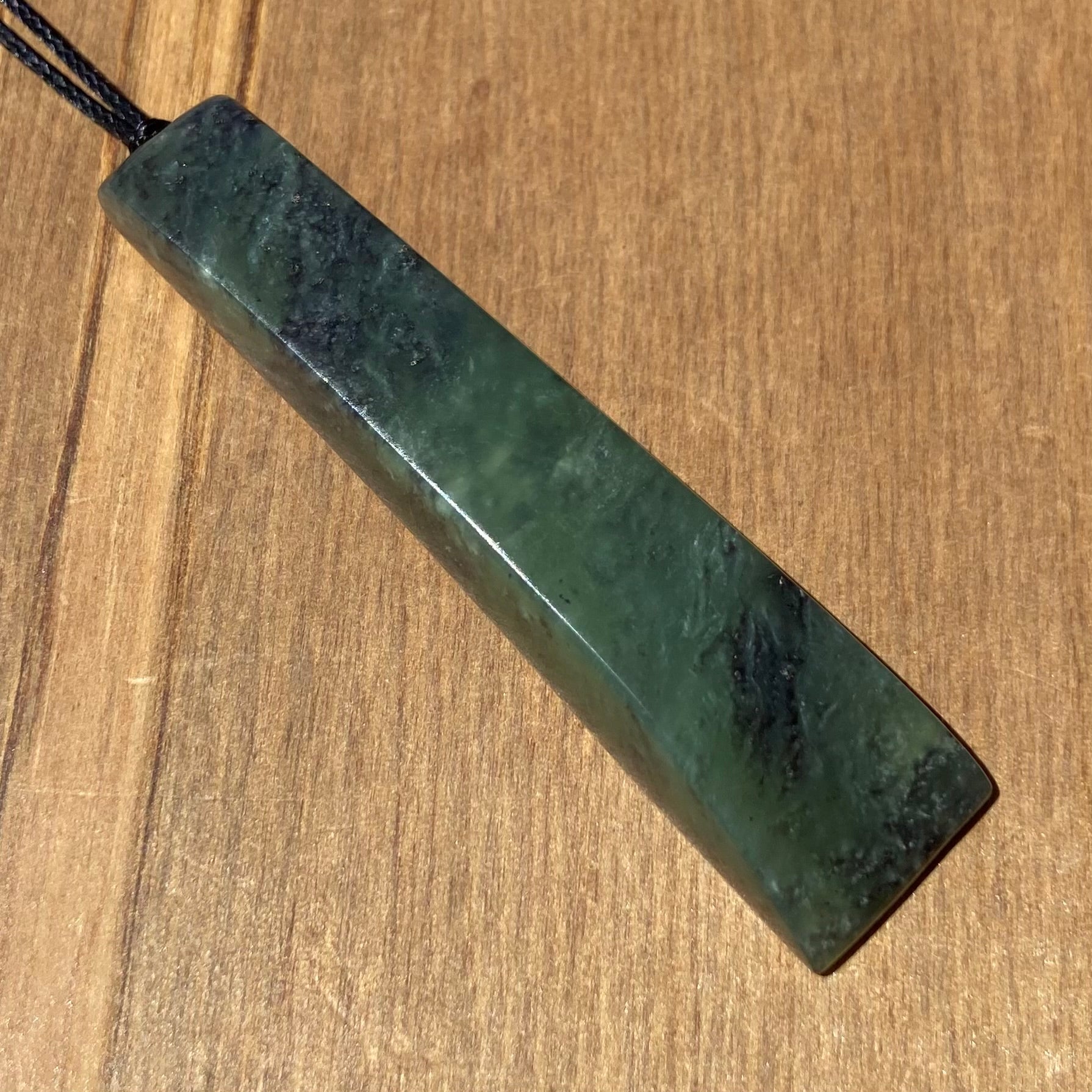 Pounamu toki from New Zealand Kawakawa pounamu (greenstone). Front.