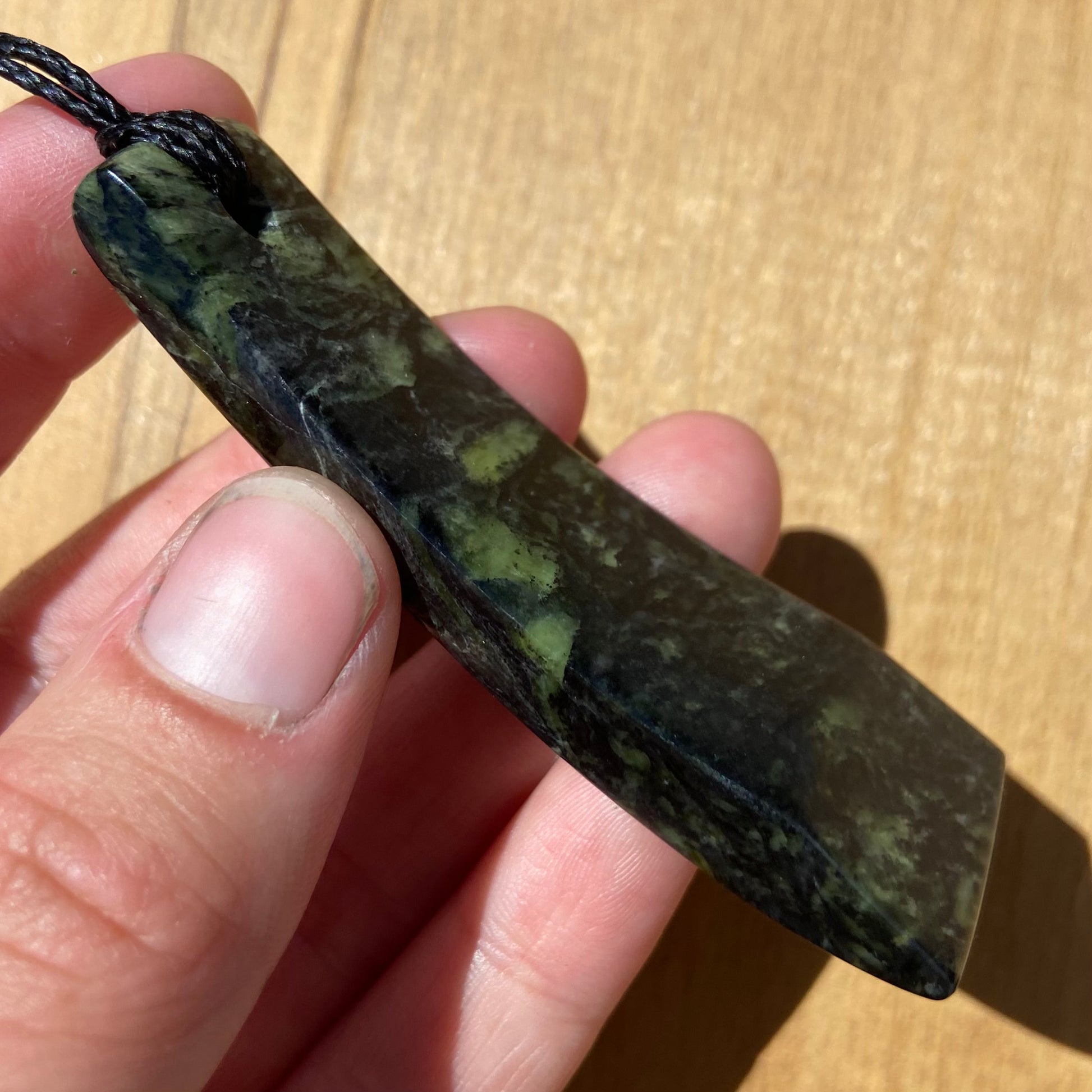 Toki pendant hand-carved from New Zealand Douglas Creek pounamu (greenstone). 