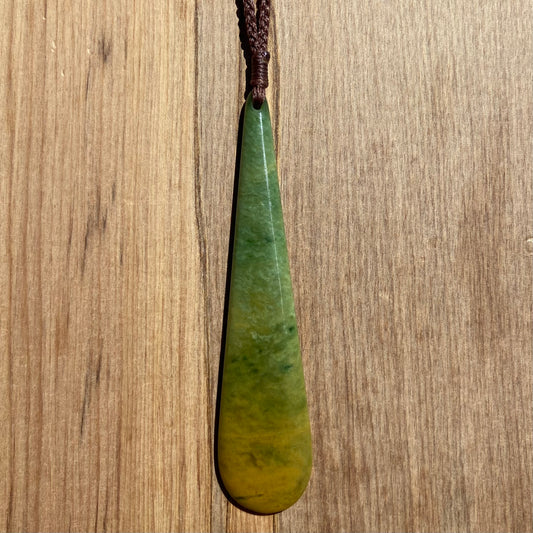 Roimata (teardrop) pendant hand-carved from New Zealand Marsden Flower Jade/ pounamu (greenstone). Front.