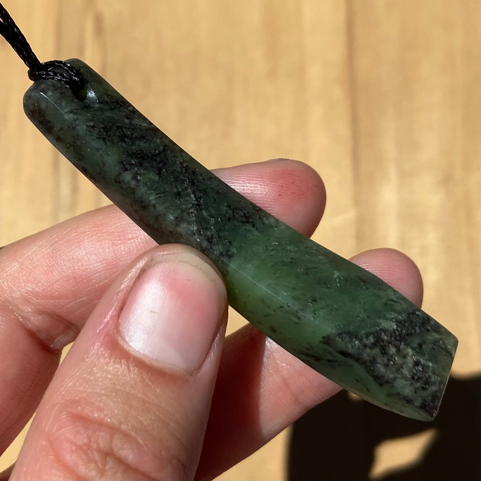 Pounamu toki from New Zealand Kawakawa pounamu (greenstone). Back.