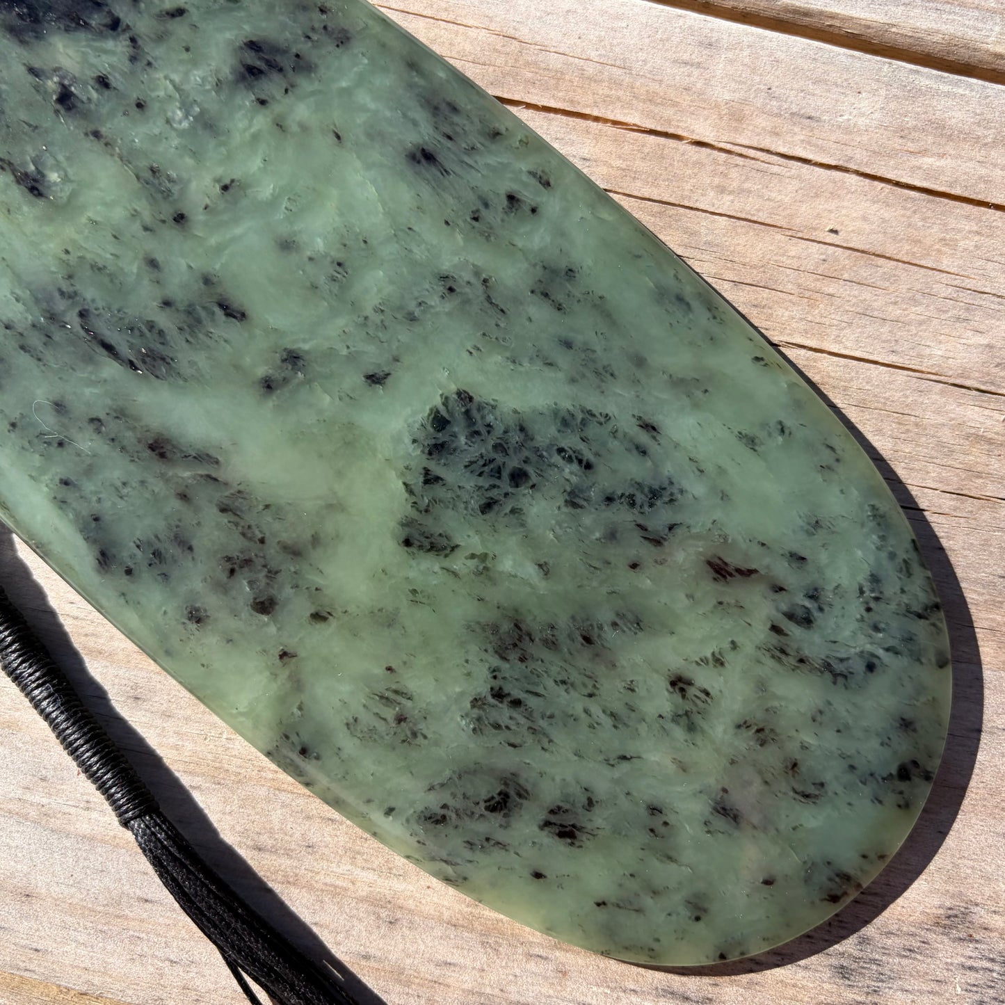 Pounamu mere hand-carved from South Westland Inanga pounamu (greenstone). Blade.