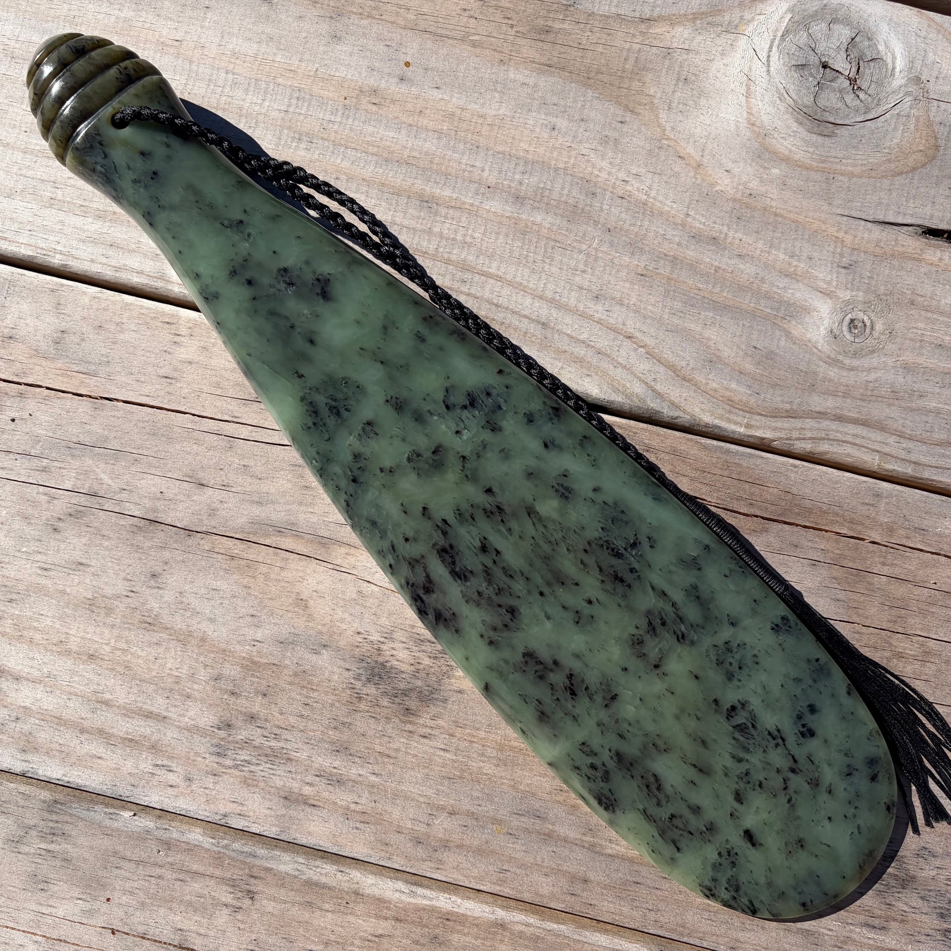 Pounamu mere hand-carved from South Westland Inanga pounamu (greenstone). Front.
