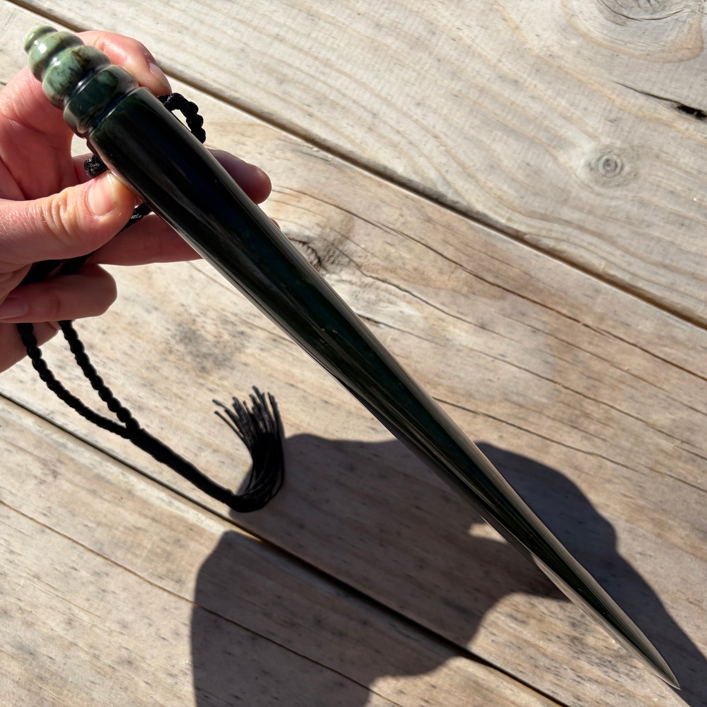Mere / Patu  hand-carved from New Zealand Kawakawa pounamu (greenstone). Edge.