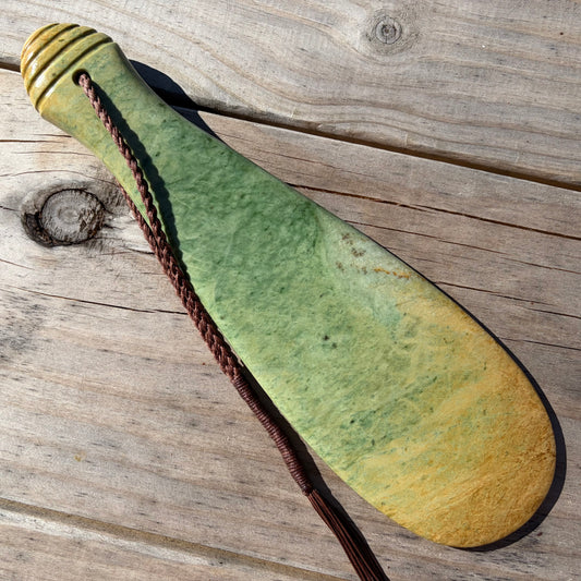 Pounamu mere hand-carved from Marsden flower jade pounamu (greenstone). Front.