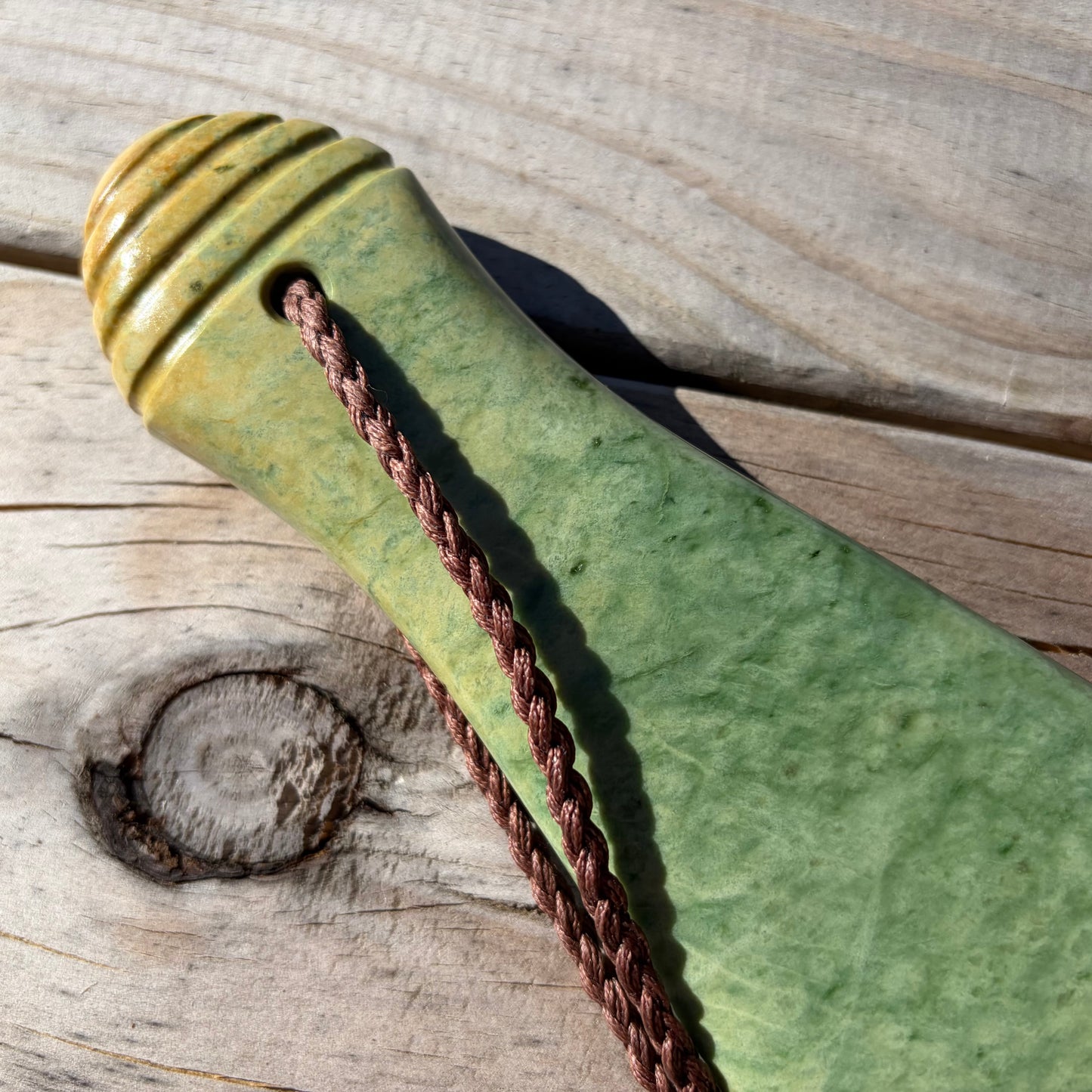 Pounamu mere hand-carved from Marsden flower jade pounamu (greenstone). Handle.