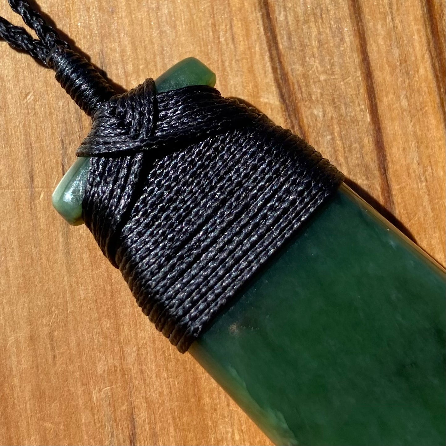 Bound toki pendant hand-carved from New Zealand Marsden Flower Jade/ pounamu (greenstone). Binding.