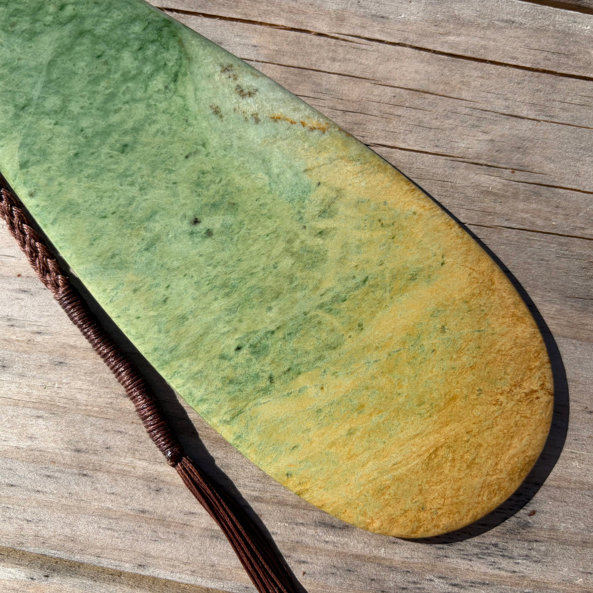 Pounamu mere hand-carved from Marsden flower jade pounamu (greenstone). Blade.