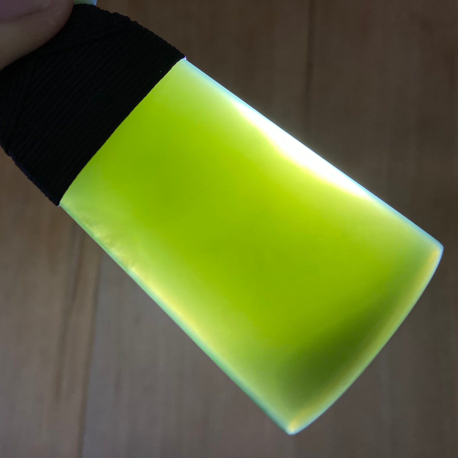 Bound toki pendant hand-carved from New Zealand inanga pounamu (greenstone). Translucency.