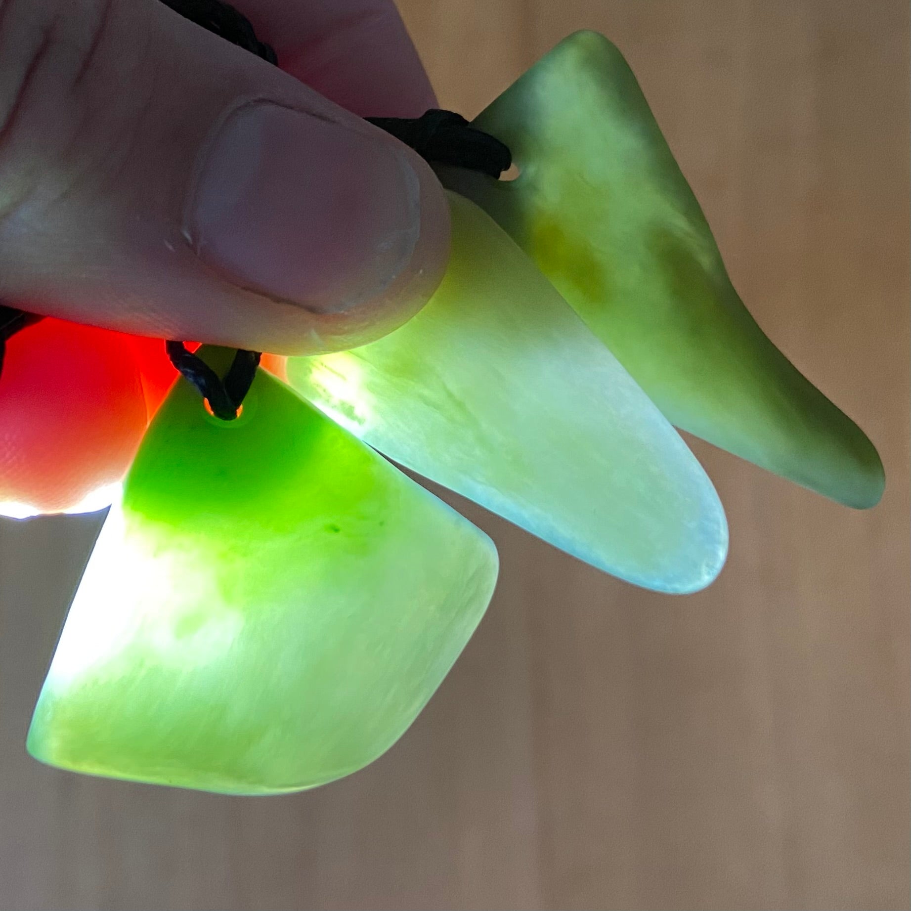 Tumbled NZ Pounamu pendants, bulk set of 20 pieces. Translucency.