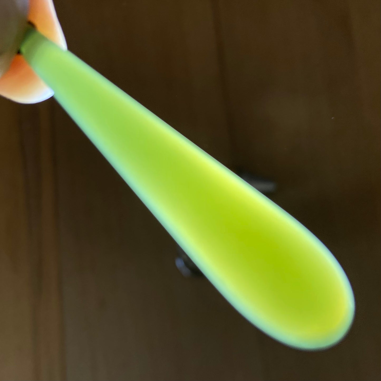 Roimata teardrop pendant carved from New Zealand inanga pounamu (greenstone). Translucency. 