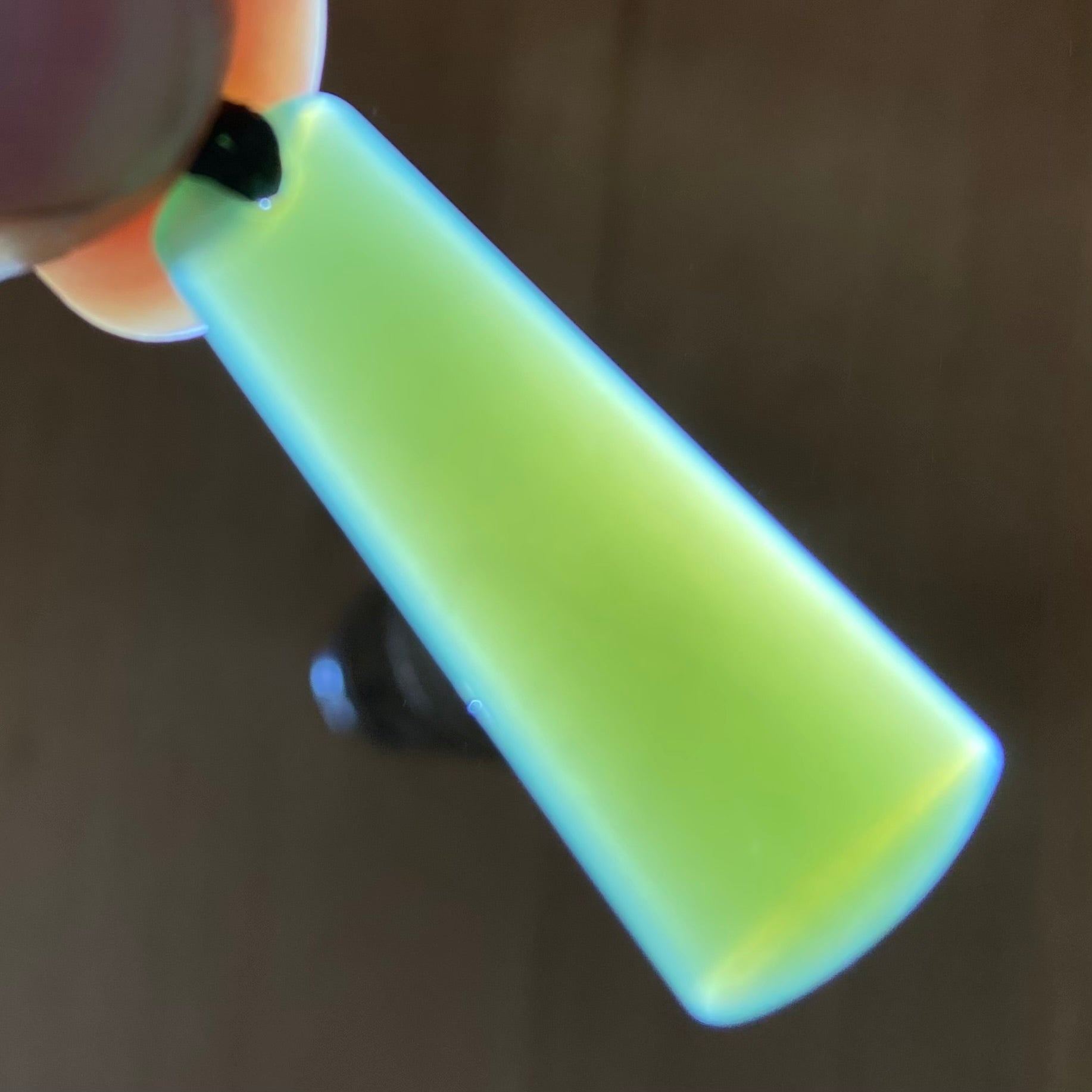 Toki pendant hand-carved from New Zealand inanga pounamu (greenstone). Translucency.