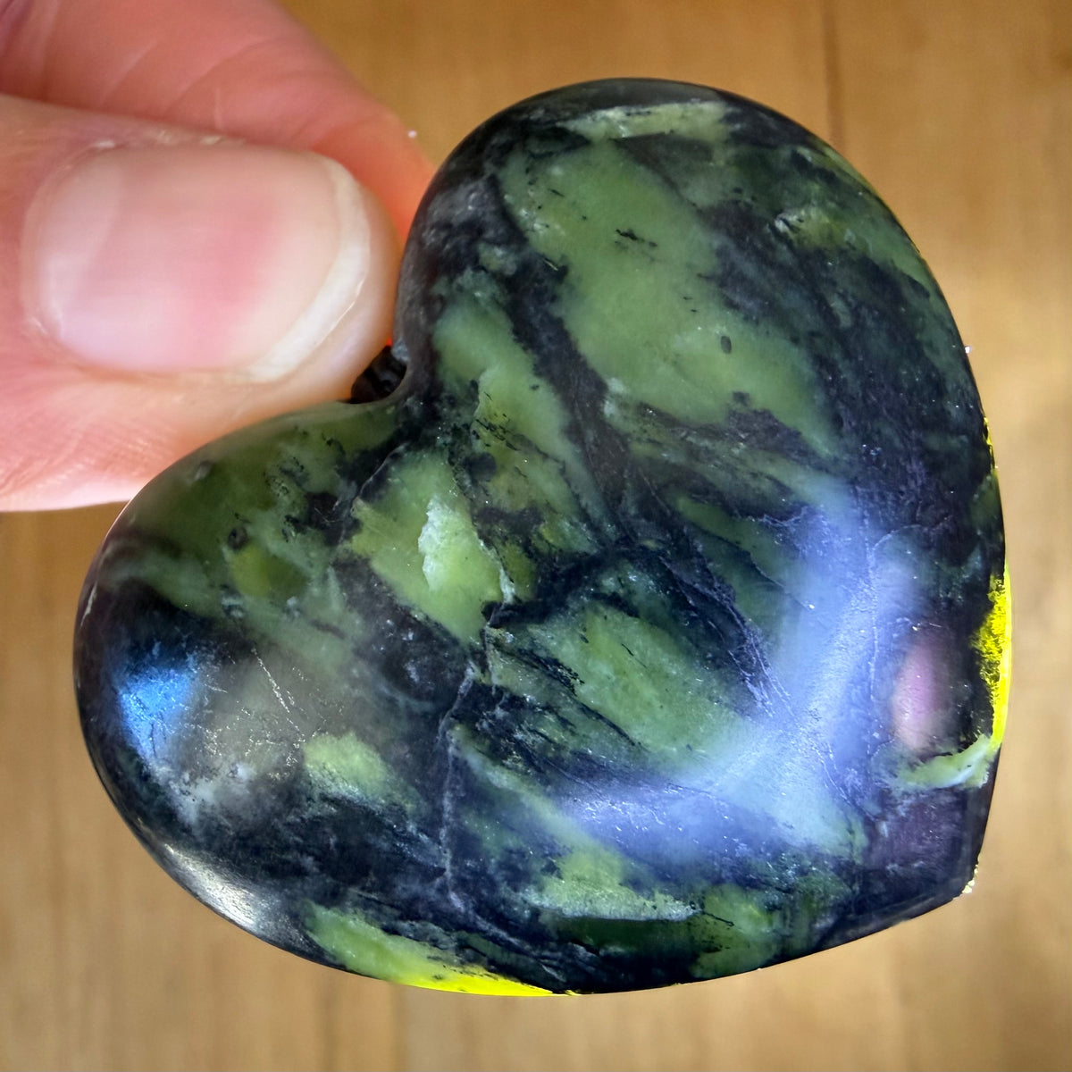 Heart pendant hand-carved from New Zealand Douglas Creek pounamu (greenstone). Translucency.