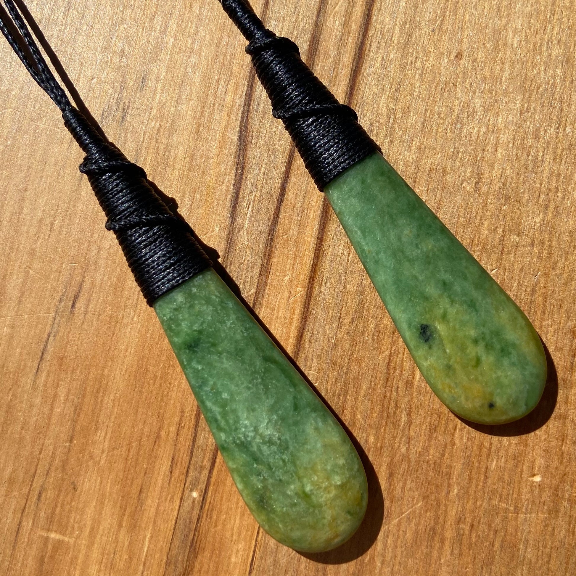 Roimata pendant set hand-carved from New Zealand Marsden Flower Jade/ pounamu (greenstone). Perfect for best friends. Front.
