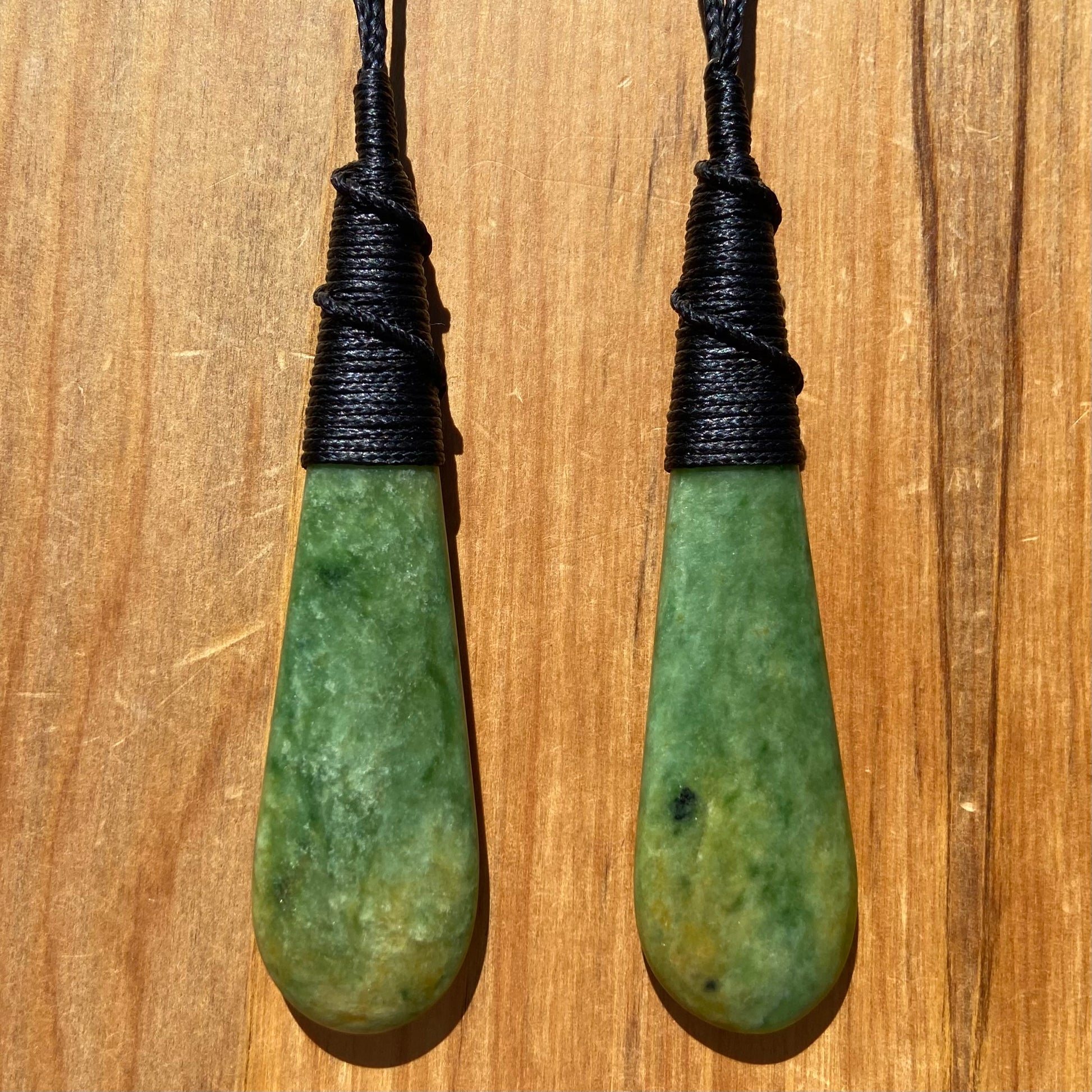 Roimata pendant set hand-carved from New Zealand Marsden Flower Jade/ pounamu (greenstone). Perfect for best friends. Front.