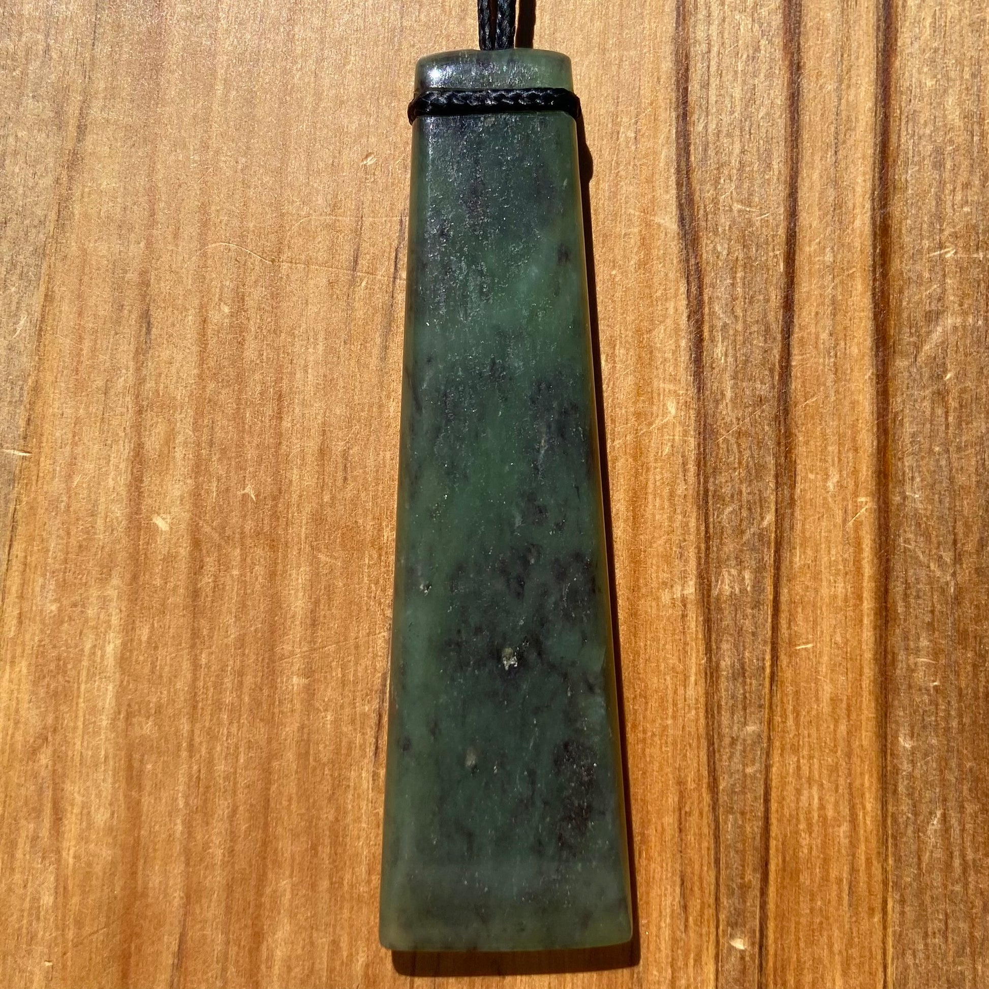 Pounamu toki from New Zealand Kawakawa pounamu (greenstone). Front.