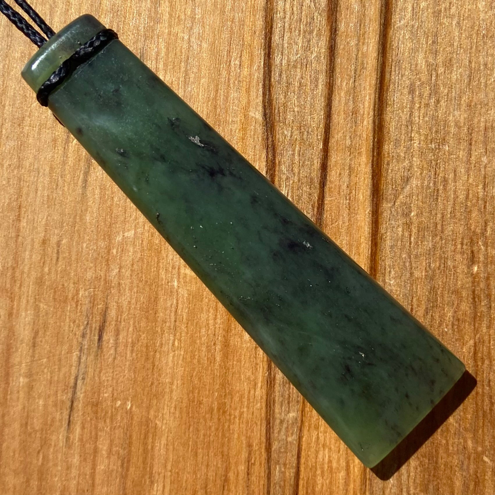Pounamu toki from New Zealand Kawakawa pounamu (greenstone). Back.