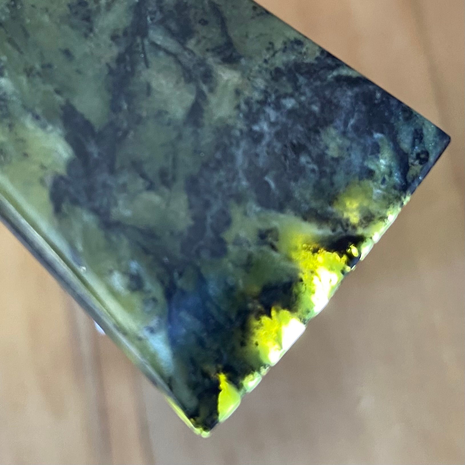 Bound toki pendant hand-carved from New Zealand Douglas Creek pounamu (greenstone). Translucency.